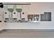 Indoor utility area with solar panels and electrical panel on a wall at 6536 Simone Shores Cir, Apollo Beach, FL 33572