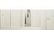 Bright bathroom featuring a glass-enclosed shower and access to a walk-in closet at 6841 E 115Th St, Palmetto, FL 34221