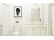 Clean bathroom with white vanity, framed mirror, and combined shower and tub at 6841 E 115Th St, Palmetto, FL 34221