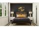 Cozy main bedroom features a wood-accent headboard and neutral decor at 6841 E 115Th St, Palmetto, FL 34221