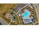 Overhead view of community pool, playground, community center, and parking at 10809 Patoka Ter, Parrish, FL 34219