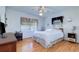 Bedroom with wood floors and a ceiling fan at 1235 45Th N St, St Petersburg, FL 33713