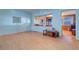 Living room with light wood floors and light blue walls at 1235 45Th N St, St Petersburg, FL 33713