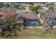 Overhead view of home showcasing a screened lanai pool and a spacious backyard at 1509 Ventana Dr, Sun City Center, FL 33573