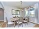 Farmhouse-style dining room with a large wooden table at 18531 Lithia Ranch Rd, Lithia, FL 33547