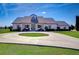 Single-story home with circular driveway and landscaping at 18531 Lithia Ranch Rd, Lithia, FL 33547