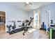 Home gym featuring weightlifting bench and treadmill at 18531 Lithia Ranch Rd, Lithia, FL 33547