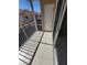 View of the balcony with tiled floors and railings at 21031 Sunpoint Way # 202, Lutz, FL 33558