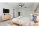 Serene bedroom with a comfortable bed, modern dresser, and minimalist decor at 2604 Knight Island Dr, Brandon, FL 33511