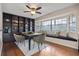 Cozy dining area featuring built-in shelving, bench seating, and hardwood floors at 3203 W San Carlos St, Tampa, FL 33629