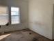 Shows a bedroom with carpet, a window, and white walls at 3208 N 15Th St, Tampa, FL 33605