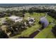 Wide aerial shot of golf course showcasing lush green fairways and mature trees at 37027 Lakota Ct, Zephyrhills, FL 33542