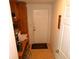 Hallway with desk, cabinets and view into another room at 37027 Lakota Ct, Zephyrhills, FL 33542