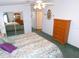 Bedroom with a mirrored closet and a dresser at 37027 Lakota Ct, Zephyrhills, FL 33542