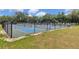 View of fenced pickle ball courts. Offers a great space to play pickle ball at 37027 Lakota Ct, Zephyrhills, FL 33542