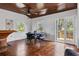 Dining area with a wood ceiling, hardwood floors, bar, windows and a French door to the deck at 468 11Th N Ave, St Petersburg, FL 33701