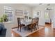 Bright dining room featuring hardwood floors, natural light, and classic decor at 468 11Th N Ave, St Petersburg, FL 33701