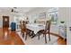 Bright dining area featuring hardwood floors, natural light, and classic decor at 468 11Th N Ave, St Petersburg, FL 33701