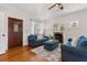 Cozy living room with fireplace, hardwood floors, and natural light at 468 11Th N Ave, St Petersburg, FL 33701