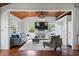 Inviting living room features modern furniture, a wood ceiling, hardwood floors, and natural light at 468 11Th N Ave, St Petersburg, FL 33701