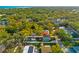 Aerial view of a two-story house with a detached garage at 5714 S 1St St, Tampa, FL 33611