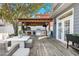 Pergola, outdoor kitchen, and seating area at 5714 S 1St St, Tampa, FL 33611