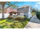 Home's backyard with deck and pergola at 5714 S 1St St, Tampa, FL 33611