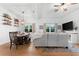 Casual dining area with wooden table and chairs near the living room at 5714 S 1St St, Tampa, FL 33611