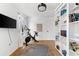 Home gym with Peloton bike, yoga mat and built-in shelves at 5714 S 1St St, Tampa, FL 33611