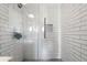 Clean and modern shower with white subway tile at 5714 S 1St St, Tampa, FL 33611