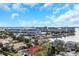 Scenic aerial view of waterfront neighborhood with city skyline in the distance at 5940 Pelican Bay S Plz # Ph E, Gulfport, FL 33707