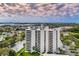 Stunning aerial view of the building showcasing city and water views at 5940 Pelican Bay S Plz # Ph E, Gulfport, FL 33707