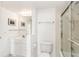 Fresh bathroom with bright lighting, a bathtub with shower and a large mirror at 5940 Pelican Bay S Plz # Ph E, Gulfport, FL 33707