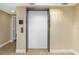 Condo elevator ready to take you to your floor at 5940 Pelican Bay S Plz # Ph E, Gulfport, FL 33707