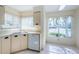 Cozy kitchen area showcasing bright natural light and tile flooring at 6171 Bahia Del Mar Blvd # 116, St Petersburg, FL 33715