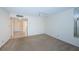 Well-lit living room featuring tile entry and carpet flooring at 6171 Bahia Del Mar Blvd # 116, St Petersburg, FL 33715