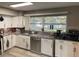 Charming kitchen with stainless steel appliances and plenty of storage at 6483 43Rd N Ave, Kenneth City, FL 33709