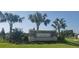 Community sign for Copperleaf with tropical palm trees and landscaping at 706 Acacia Ct, Bradenton, FL 34212