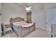 Comfortable bedroom with a large carved-wood bed frame and neutral carpeting at 8510 Kentucky Derby Dr, Odessa, FL 33556