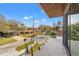 Balcony view featuring glass railings overlooking a suburban neighborhood at 910 W West St, Tampa, FL 33602