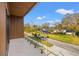 Balcony view featuring glass railings overlooking a suburban neighborhood at 910 W West St, Tampa, FL 33602