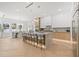 Spacious kitchen with island seating open to the dining area and bathed in natural light at 910 W West St, Tampa, FL 33602