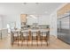 Bright, modern kitchen with a spacious island, sleek cabinetry, and stainless-steel appliances at 910 W West St, Tampa, FL 33602