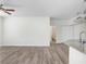 Bright living space featuring modern flooring, neutral paint and an open floorplan at 9142 Lake Chase Island Way # 9142, Tampa, FL 33626