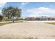 A community volleyball court, ready for a fun game in the sun at 9142 Lake Chase Island Way, Tampa, FL 33626