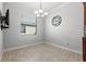 Simple dining room features tile flooring, overhead lighting, and neutral wall color at 10063 Celtic Ash Dr, Ruskin, FL 33573