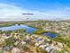 Community aerial view near the Gulf of Mexico, featuring homes and waterfront at 1007 Lake Avoca Dr, Tarpon Springs, FL 34689