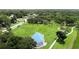 Aerial view of a park and neighborhood at 102 Brent Cir, Oldsmar, FL 34677