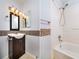 Bathroom with a vanity sink and a shower and bathtub combination at 1337 Coolmont Dr, Brandon, FL 33511