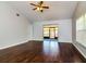 Spacious living room featuring wood floors and a ceiling fan at 1337 Coolmont Dr, Brandon, FL 33511